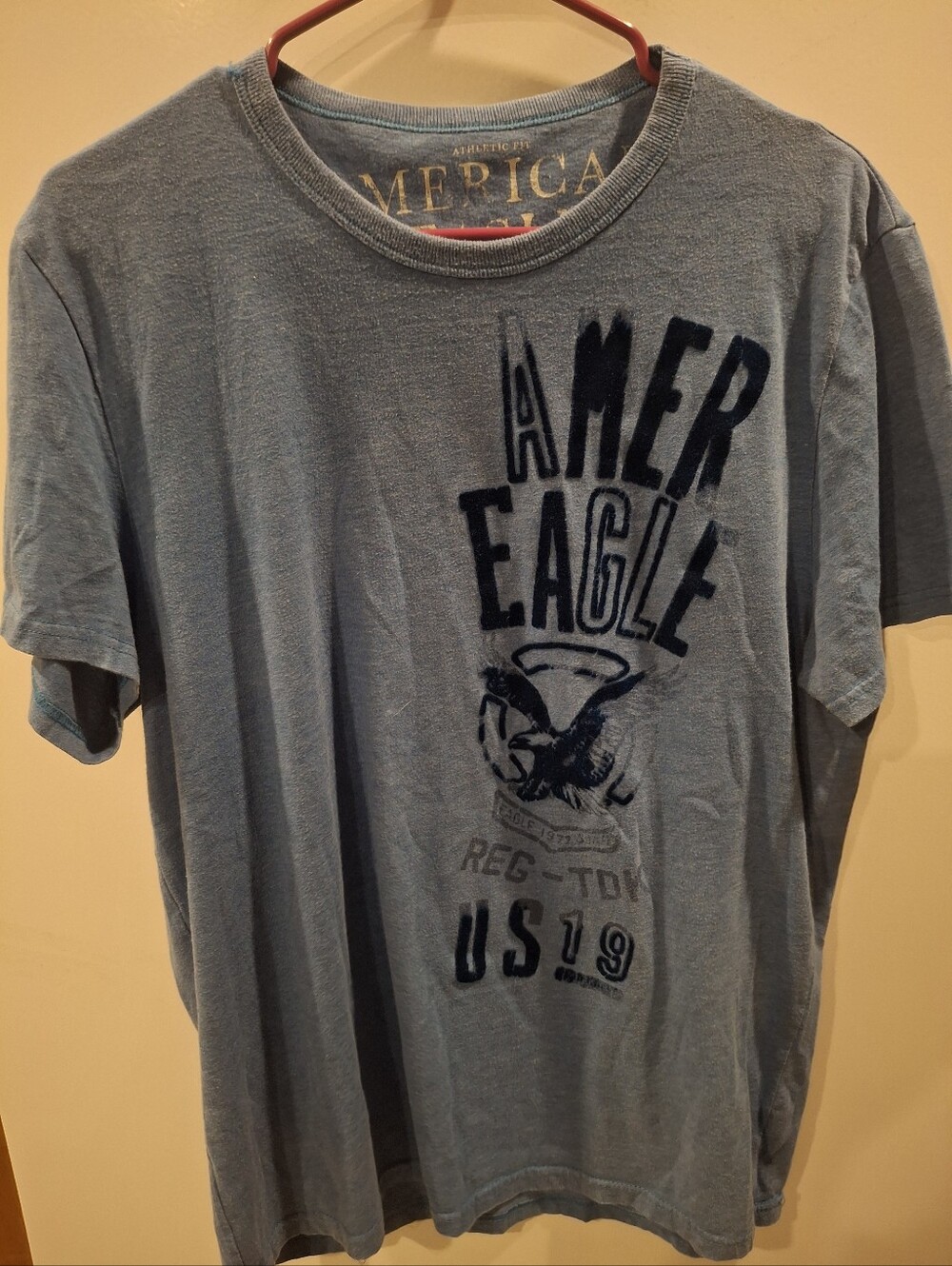 American Eagle Outfitters Light Blue Graphic Tee with Navy Logo